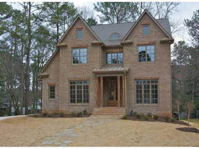 3009 Ramble Lane Decatur, GA 30033 - Photo 1 of 1 a front view of a house with a yard and garage
