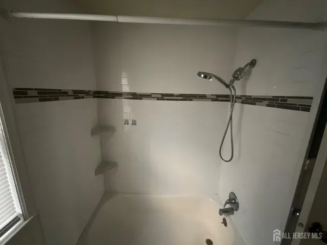 a close view of shower tap