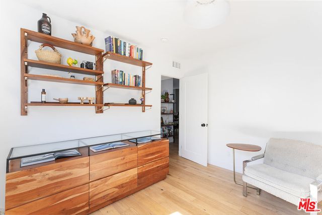 a view of a living room and bathroom