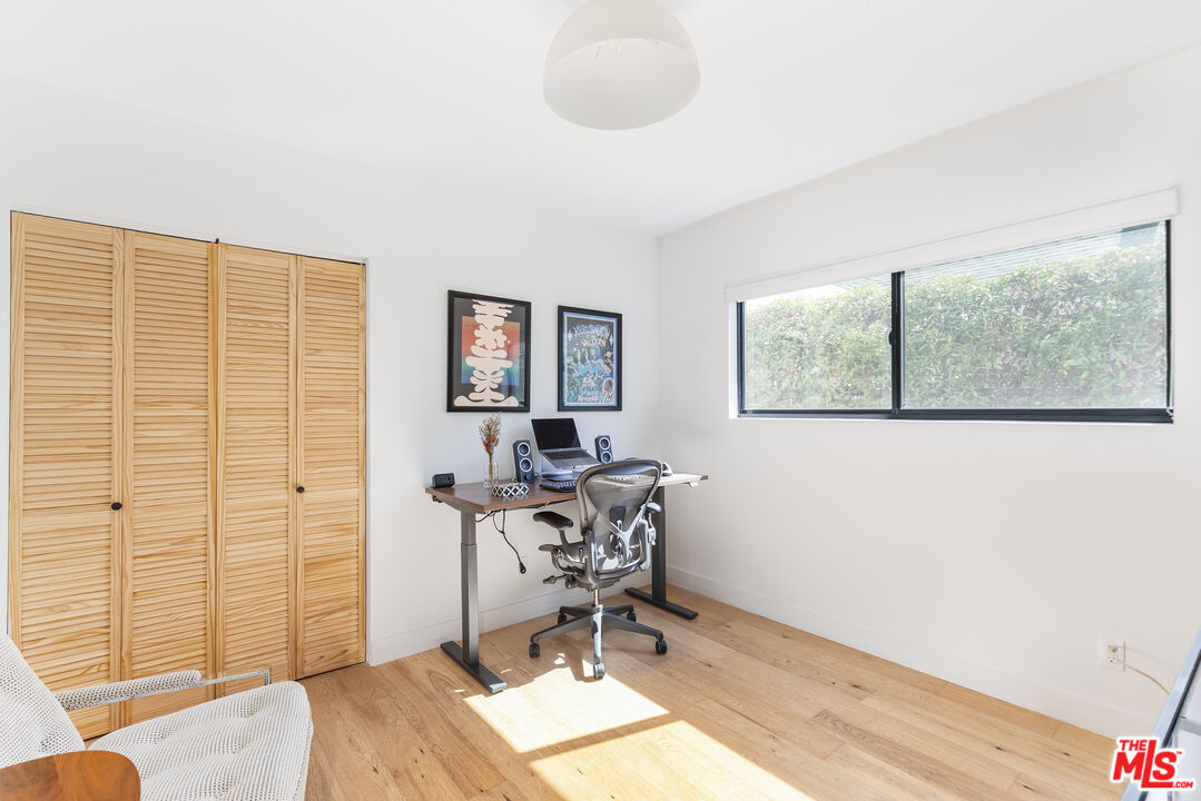 331 Brooks Avenue, Unit 2 Venice, CA 90291 - Photo 18 of 30 a workspace with wooden floor and a window