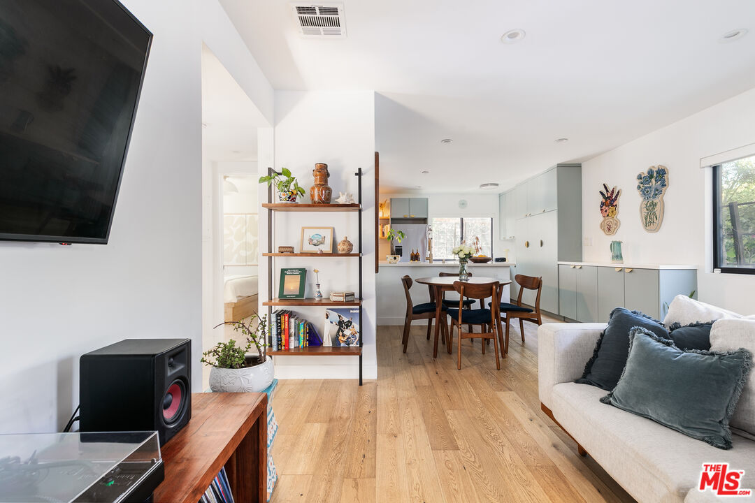 331 Brooks Avenue, Unit 2 Venice, CA 90291 - Photo 10 of 30 a living room with furniture and a flat screen tv