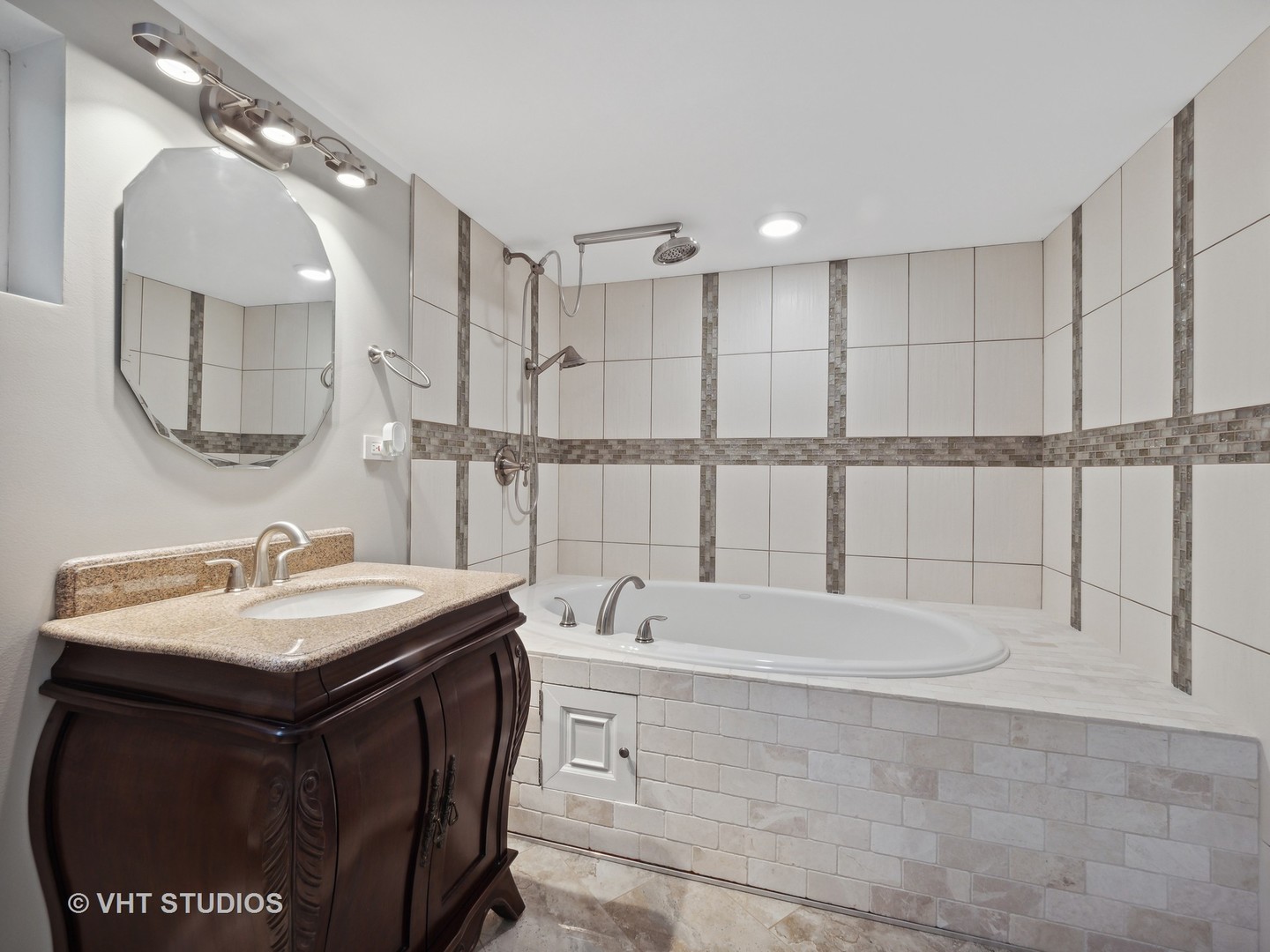22811 North Quentin Road Kildeer, IL 60047 - Photo 19 of 29 a bathroom with a tub sink and mirror