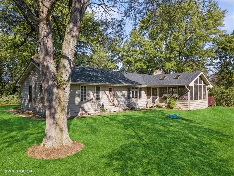 22811 North Quentin Road Kildeer, IL 60047 - Photo 23 of 29 a front view of a house with a garden