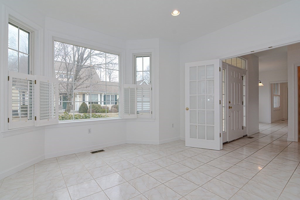 2 Braeburn Lane, Unit 2 Ashland, MA 01721 - Photo 11 of 36 a view of an empty room with a window