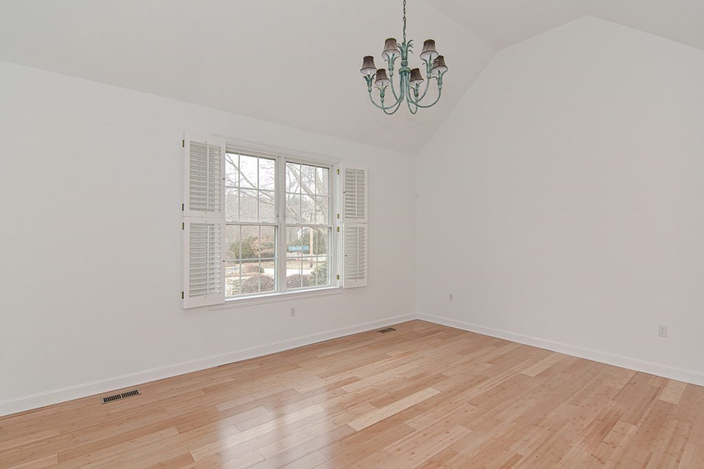 2 Braeburn Lane, Unit 2 Ashland, MA 01721 - Photo 22 of 36 an empty room with a window
