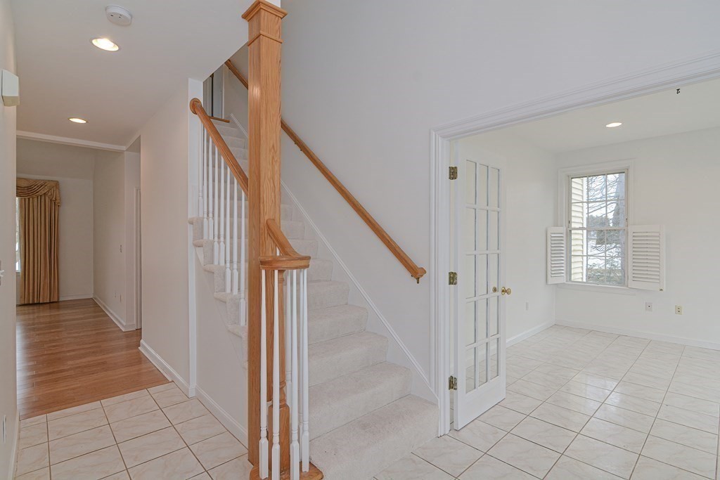 2 Braeburn Lane, Unit 2 Ashland, MA 01721 - Photo 10 of 36 a view of an entryway with stairs