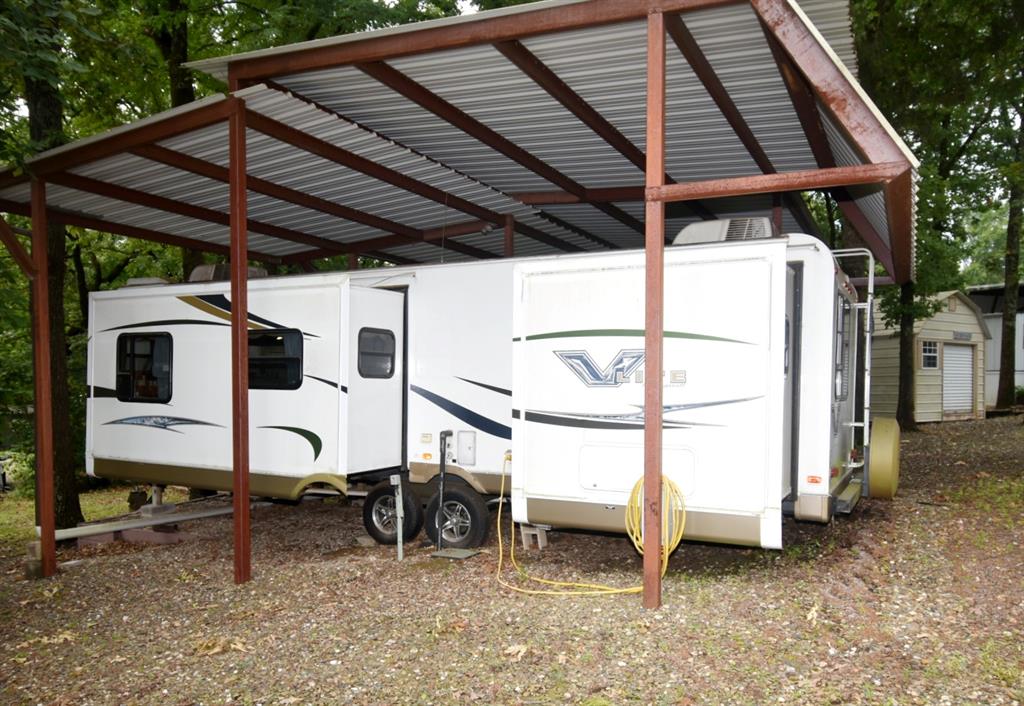6435 FM 17, Unit 477 Yantis, TX 75497 - Photo 13 of 35 a view of house with a large window and sitting area