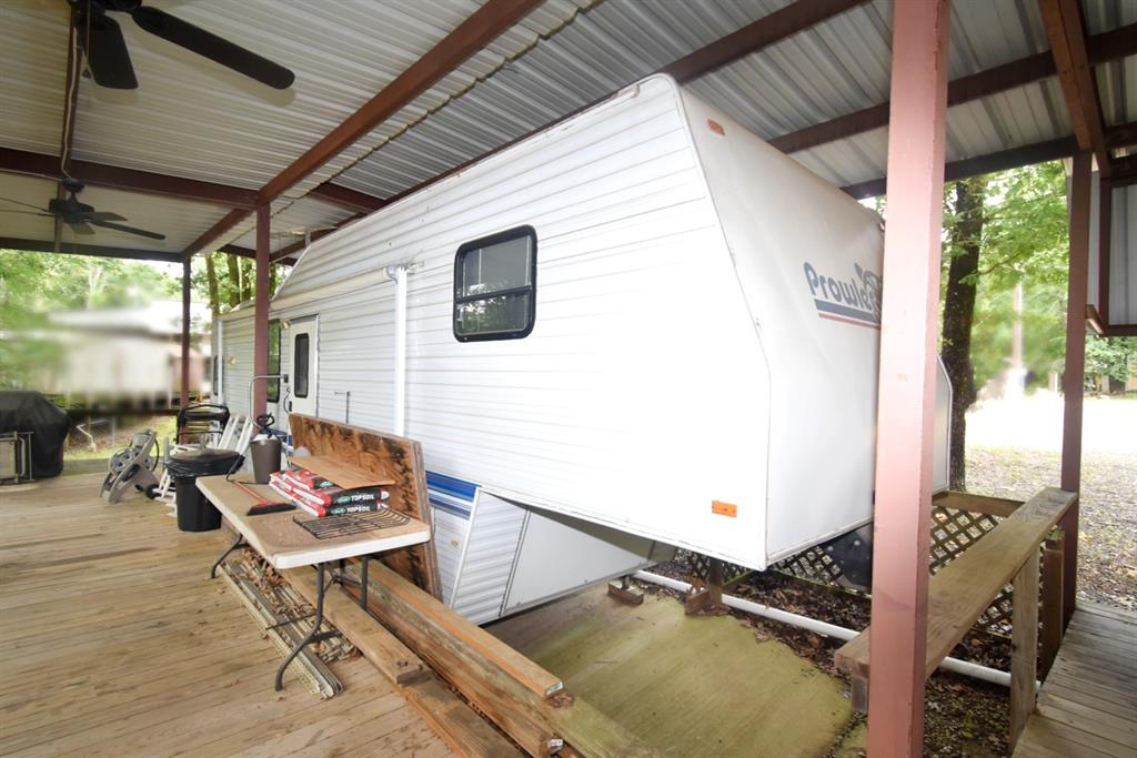 6435 FM 17, Unit 477 Yantis, TX 75497 - Photo 23 of 35 a outdoor space with furniture