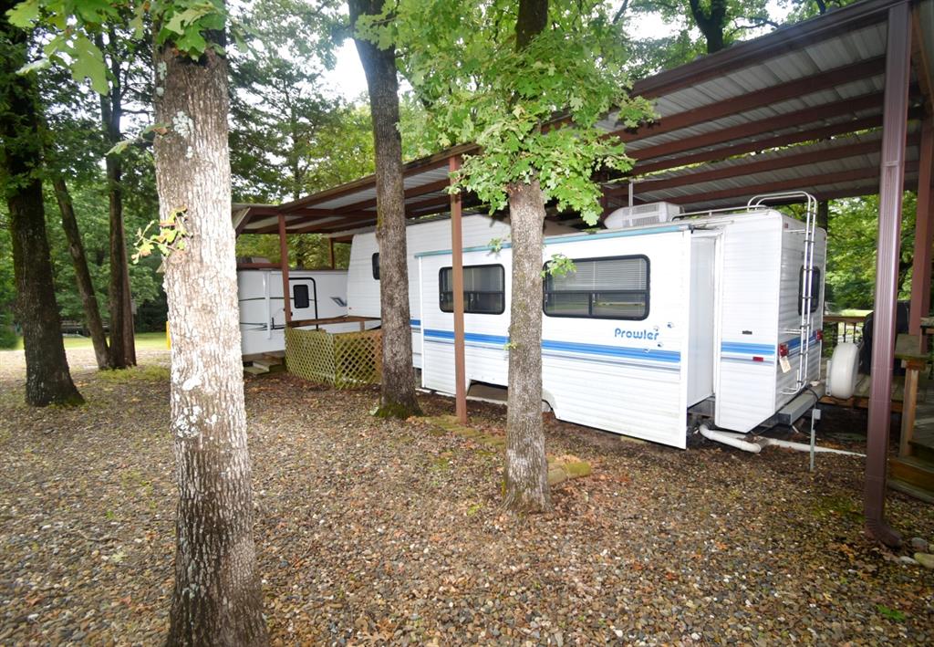 6435 FM 17, Unit 477 Yantis, TX 75497 - Photo 24 of 35 a house view with a backyard space