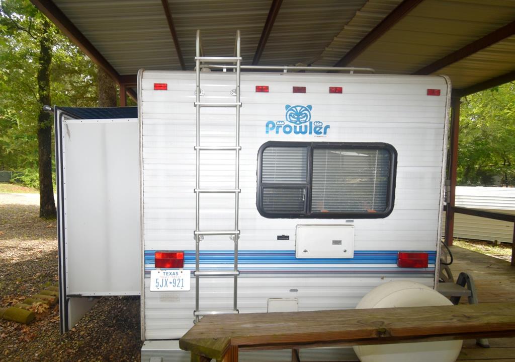 6435 FM 17, Unit 477 Yantis, TX 75497 - Photo 25 of 35 a utility room with dryer and washer