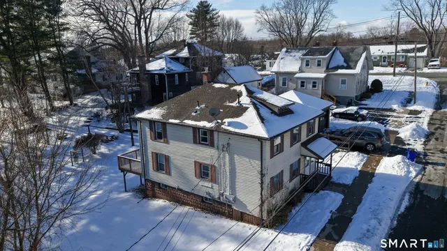 a front view of a house with yard