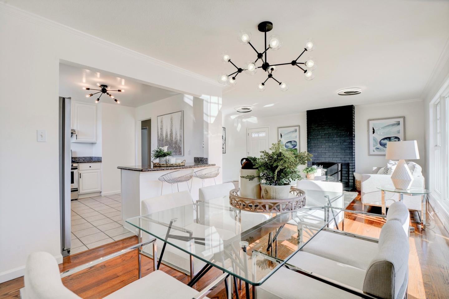 391 Imperial Drive Pacifica, CA 94044 - Photo 15 of 60 a living room with furniture and a flat screen tv