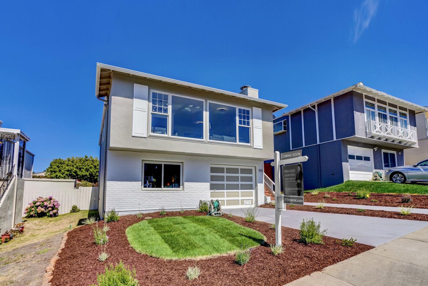 391 Imperial Drive Pacifica, CA 94044 - Photo 2 of 60 a front view of a house with garden