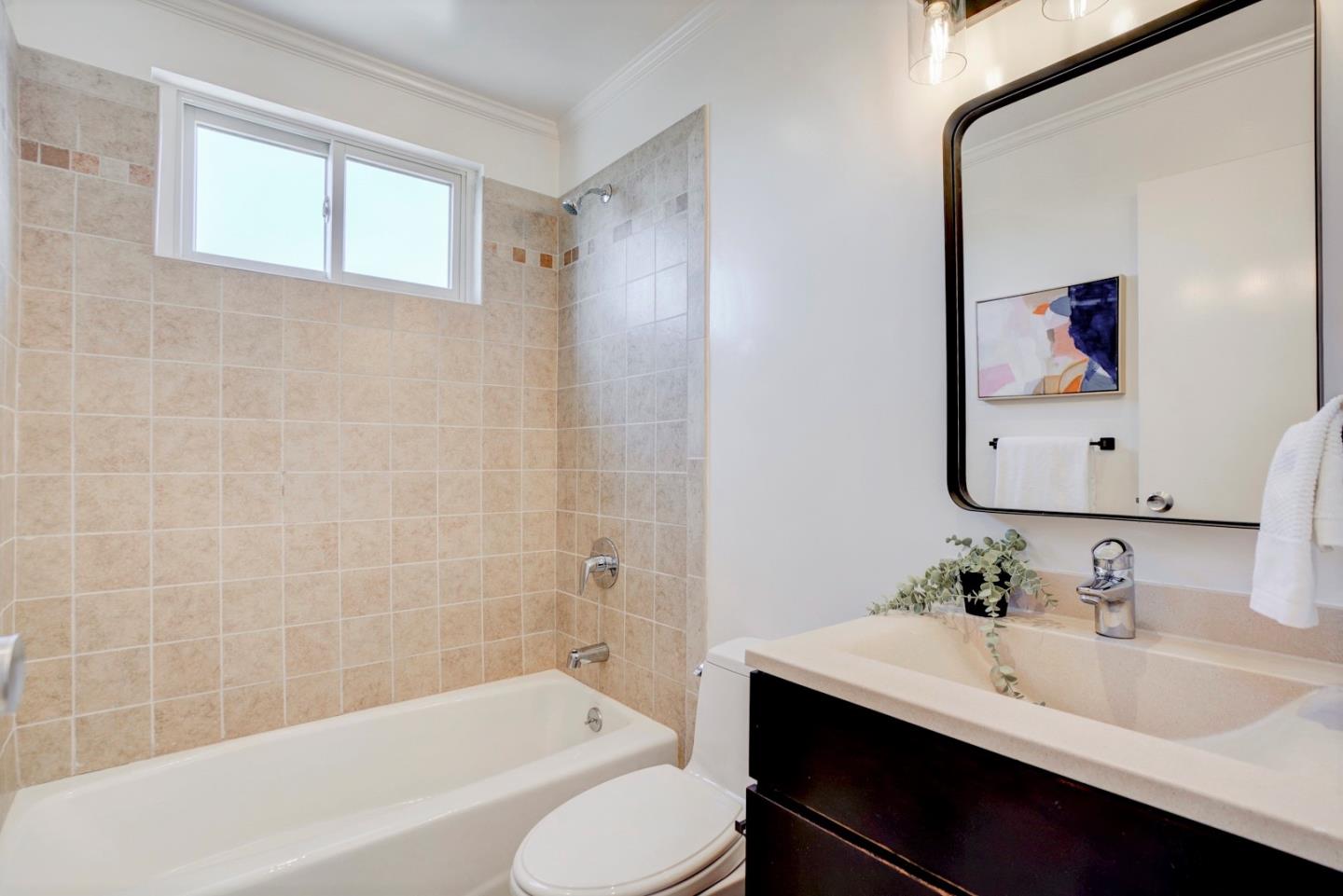 391 Imperial Drive Pacifica, CA 94044 - Photo 35 of 60 a bathroom with a sink and a mirror