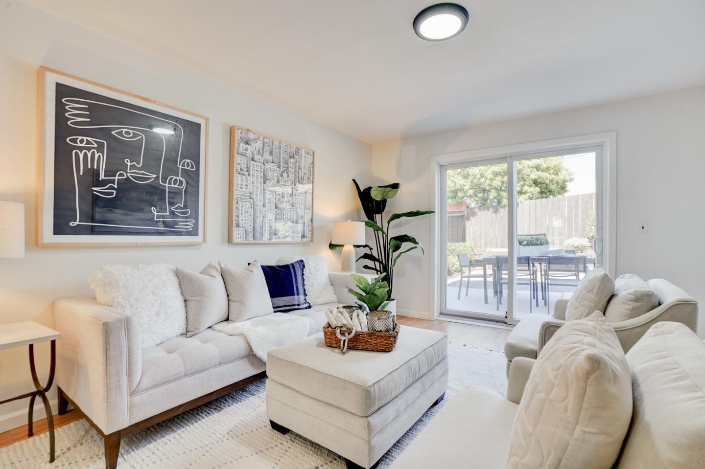 391 Imperial Drive Pacifica, CA 94044 - Photo 37 of 60 a living room with furniture and a large window