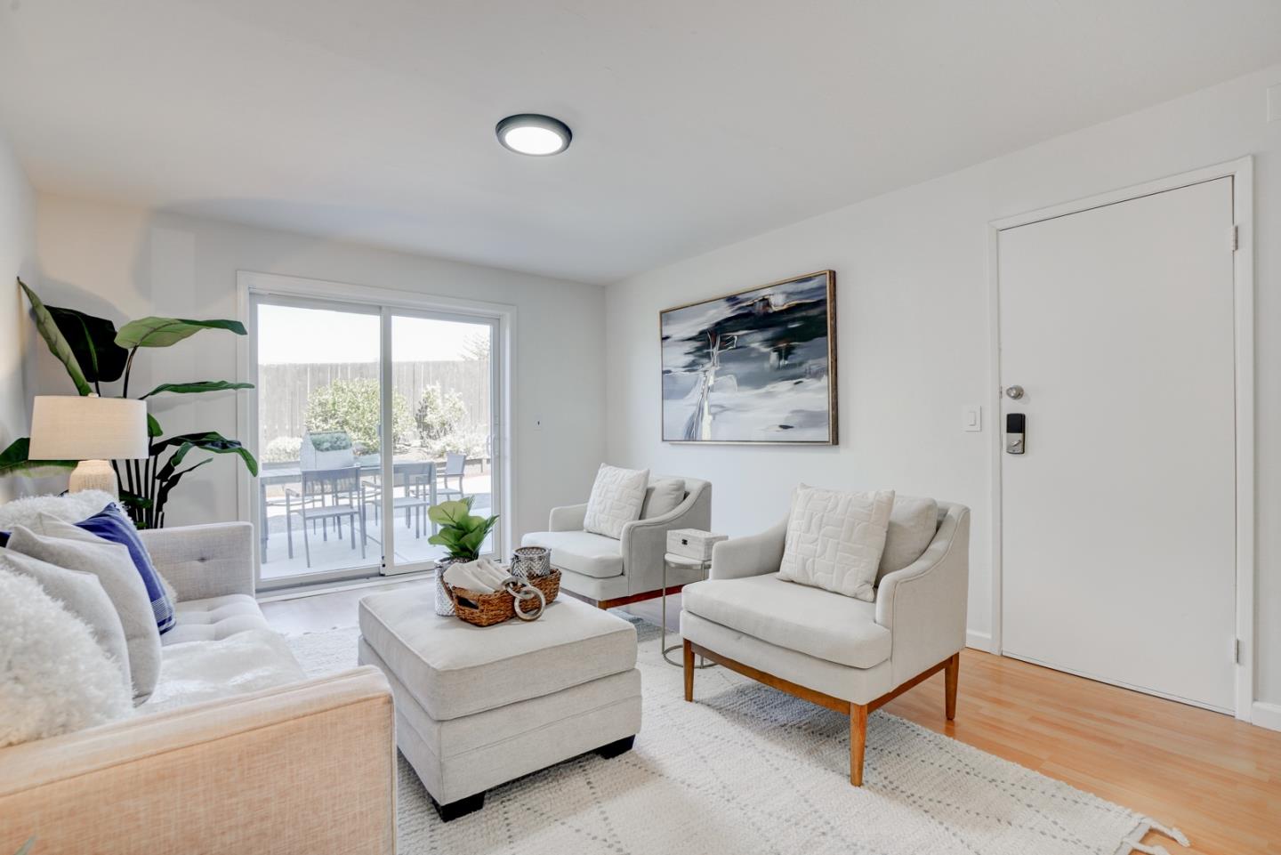391 Imperial Drive Pacifica, CA 94044 - Photo 38 of 60 a living room with furniture and a large window
