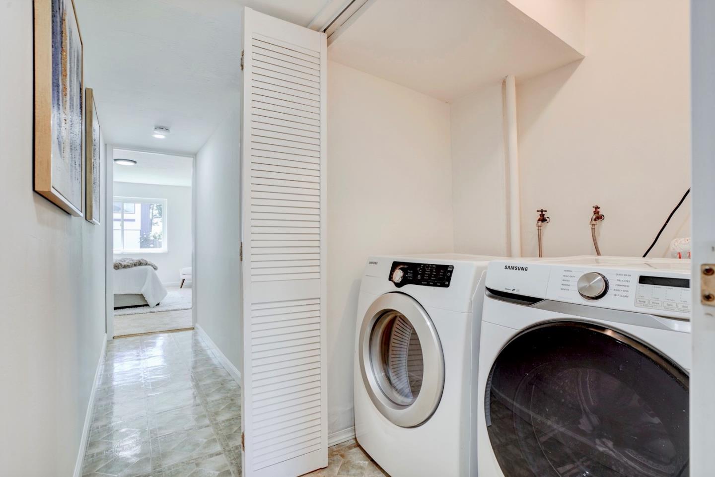 391 Imperial Drive Pacifica, CA 94044 - Photo 43 of 60 a view of a storage & utility room with washer and dryer