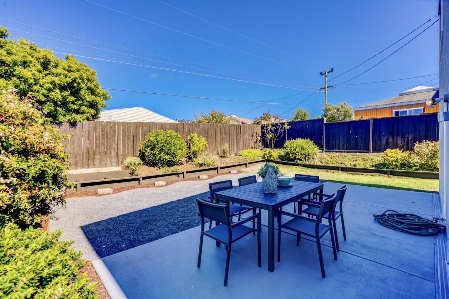 391 Imperial Drive Pacifica, CA 94044 - Photo 48 of 60 a view of a chairs and table in patio