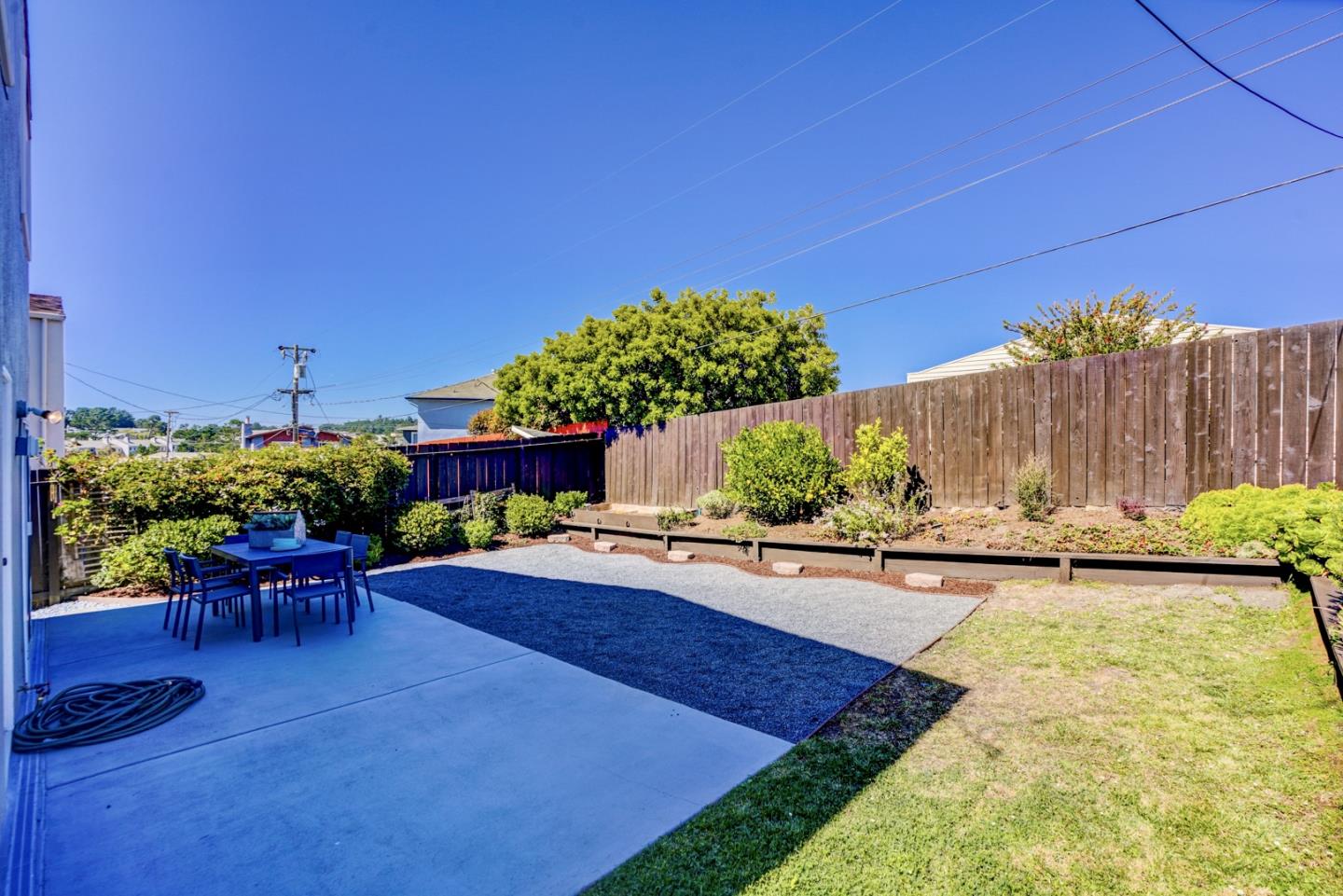 391 Imperial Drive Pacifica, CA 94044 - Photo 52 of 60 a view of a backyard with sitting area