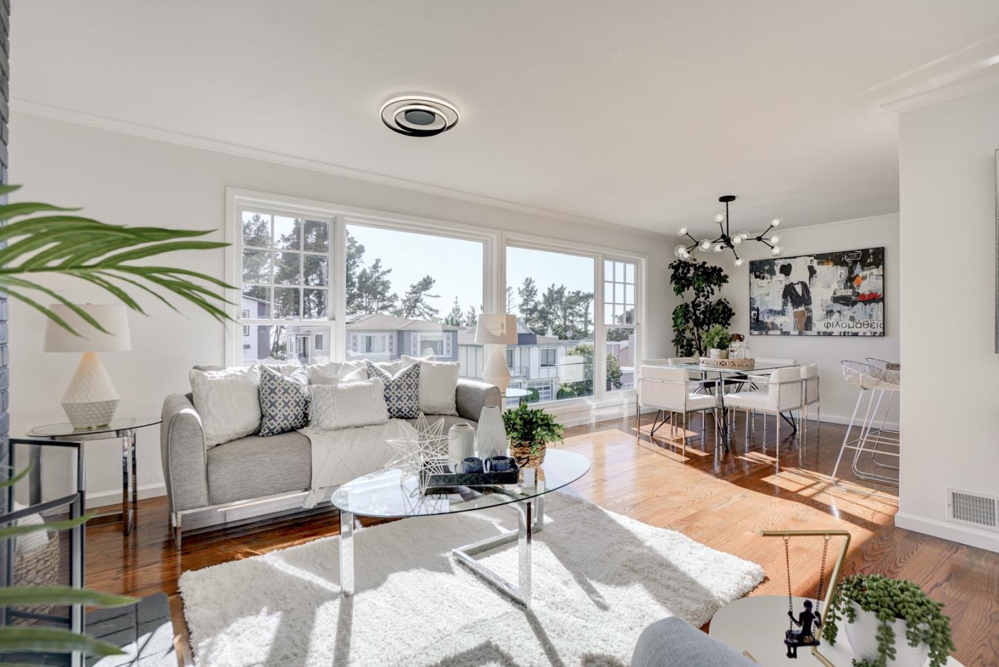 391 Imperial Drive Pacifica, CA 94044 - Photo 6 of 60 a living room with furniture and a large window