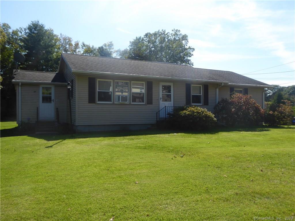 67 Fairgrounds Road Brooklyn, CT 06234 - Photo 1 of 1 a house view with a garden space