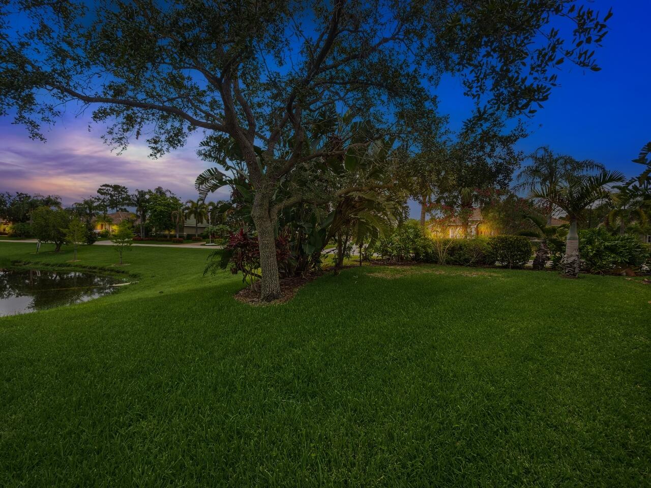 8938 First Tee Road Port St. Lucie, FL 34986 - Photo 19 of 36 Backyard Night Shot