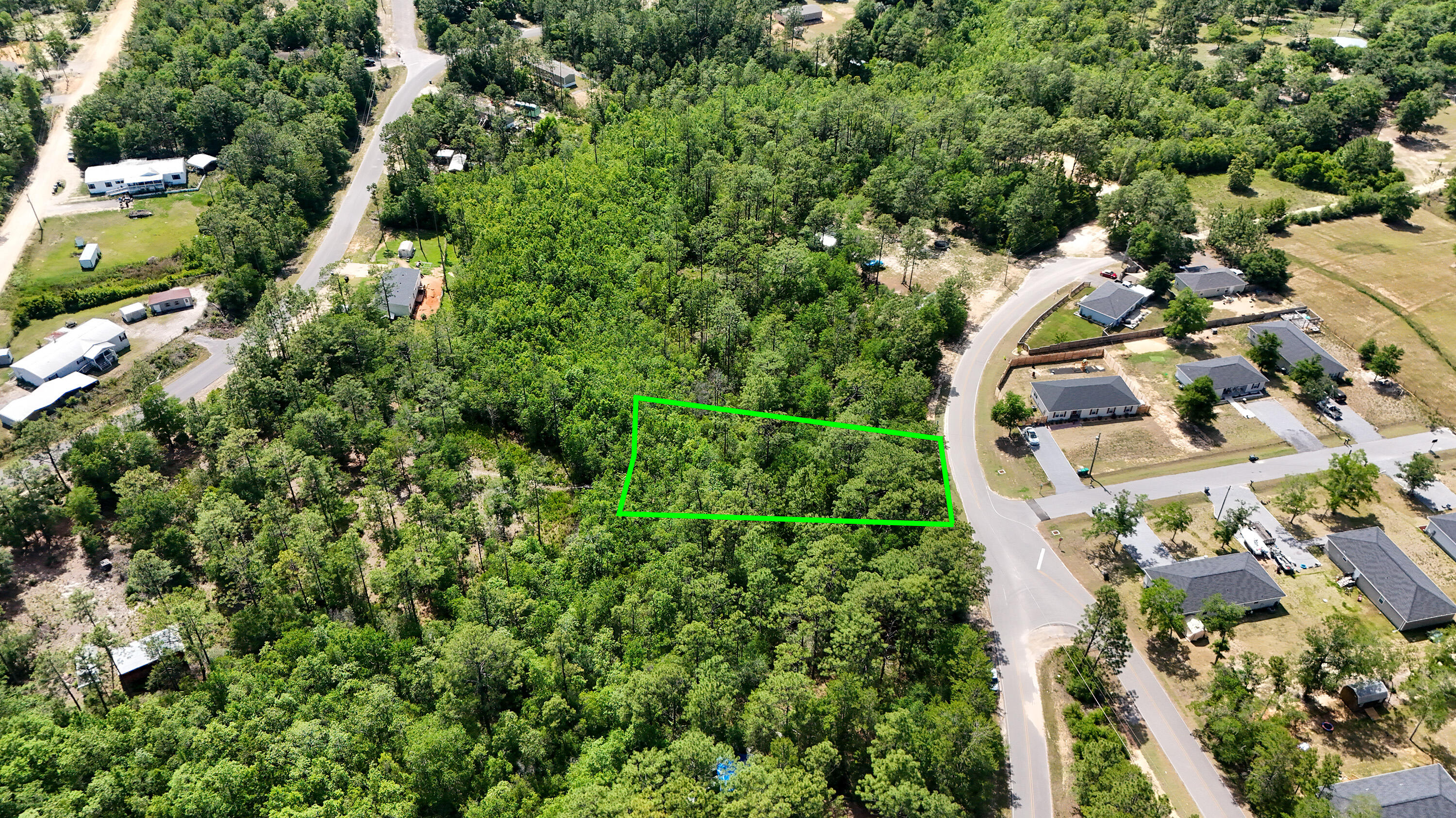 Tbd Brookside Drive DeFuniak Springs, FL 32433 - Photo 4 of 6 an aerial view of residential house with outdoor space and trees all around