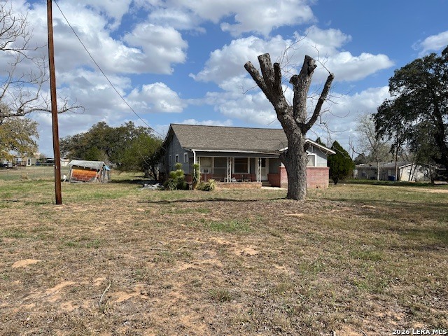 2790 2nd Street Pleasanton, TX 78064 - Photo 2 of 3 a view of a house with a yard