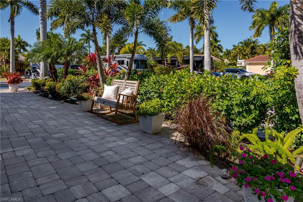 13583 Snook Circle Naples, FL 34114 - Photo 23 of 47 a view of a yard with plants