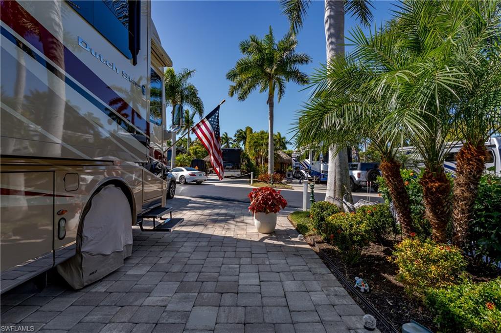 13583 Snook Circle Naples, FL 34114 - Photo 28 of 47 a view of outdoor space deck and barbeque oven