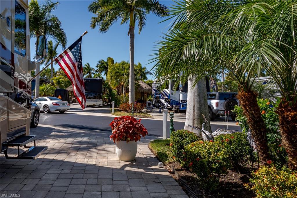 13583 Snook Circle Naples, FL 34114 - Photo 31 of 47 a view of outdoor space with sitting area