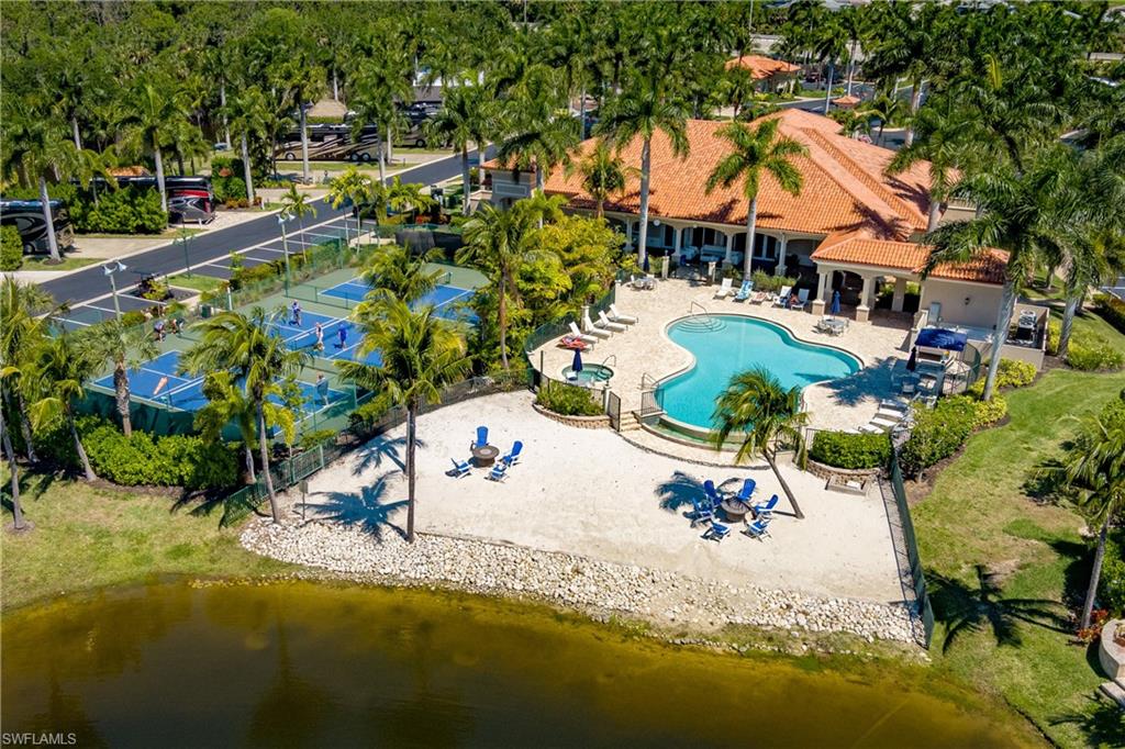 13583 Snook Circle Naples, FL 34114 - Photo 40 of 47 an aerial view of residential houses with outdoor space and swimming pool