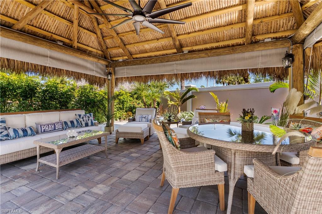 13583 Snook Circle Naples, FL 34114 - Photo 5 of 47 a outdoor space with lots of furniture and garden view