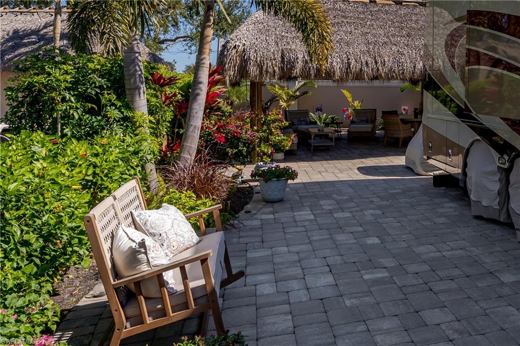 13583 Snook Circle Naples, FL 34114 - Photo 7 of 47 a view of yard with patio