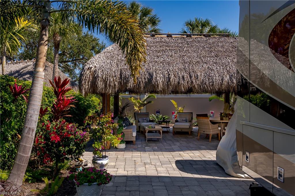 13583 Snook Circle Naples, FL 34114 - Photo 8 of 47 a view of outdoor space and patio