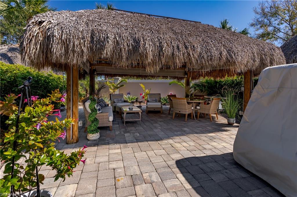 13583 Snook Circle Naples, FL 34114 - Photo 9 of 47 a view of outdoor space deck and patio