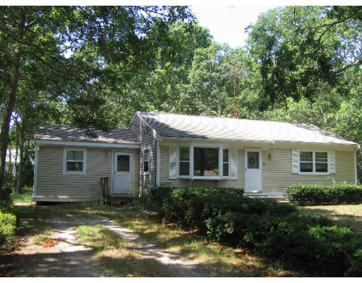 812 County Road Bourne, MA 02559 - Photo 1 of 1 a view of a house with yard and plants
