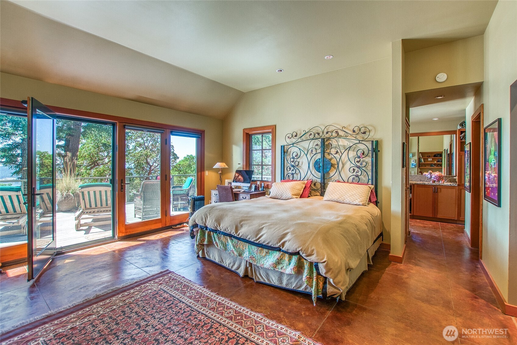 64 Hammond Lane Orcas Island, WA 98245 - Photo 19 of 39 a bed sitting in a spacious bedroom next to a window