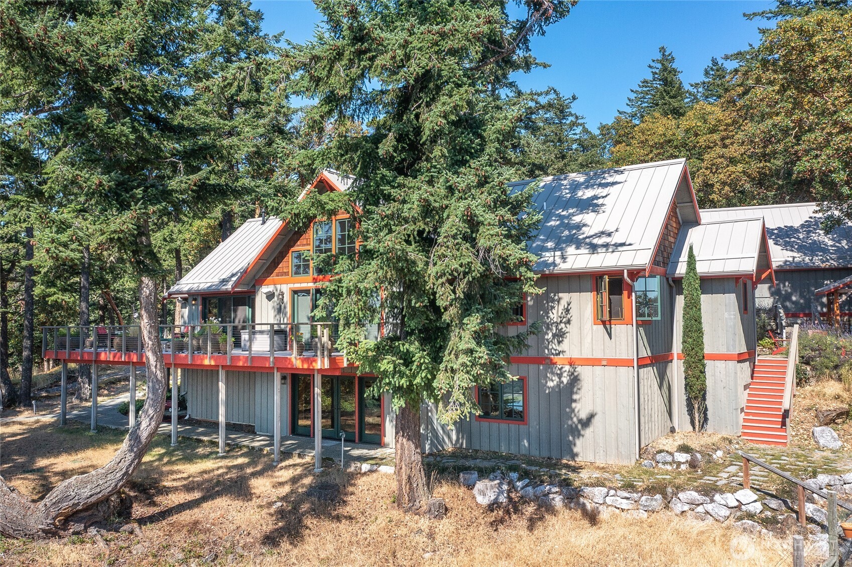64 Hammond Lane Orcas Island, WA 98245 - Photo 2 of 39 a view of a house with a tree park front a house