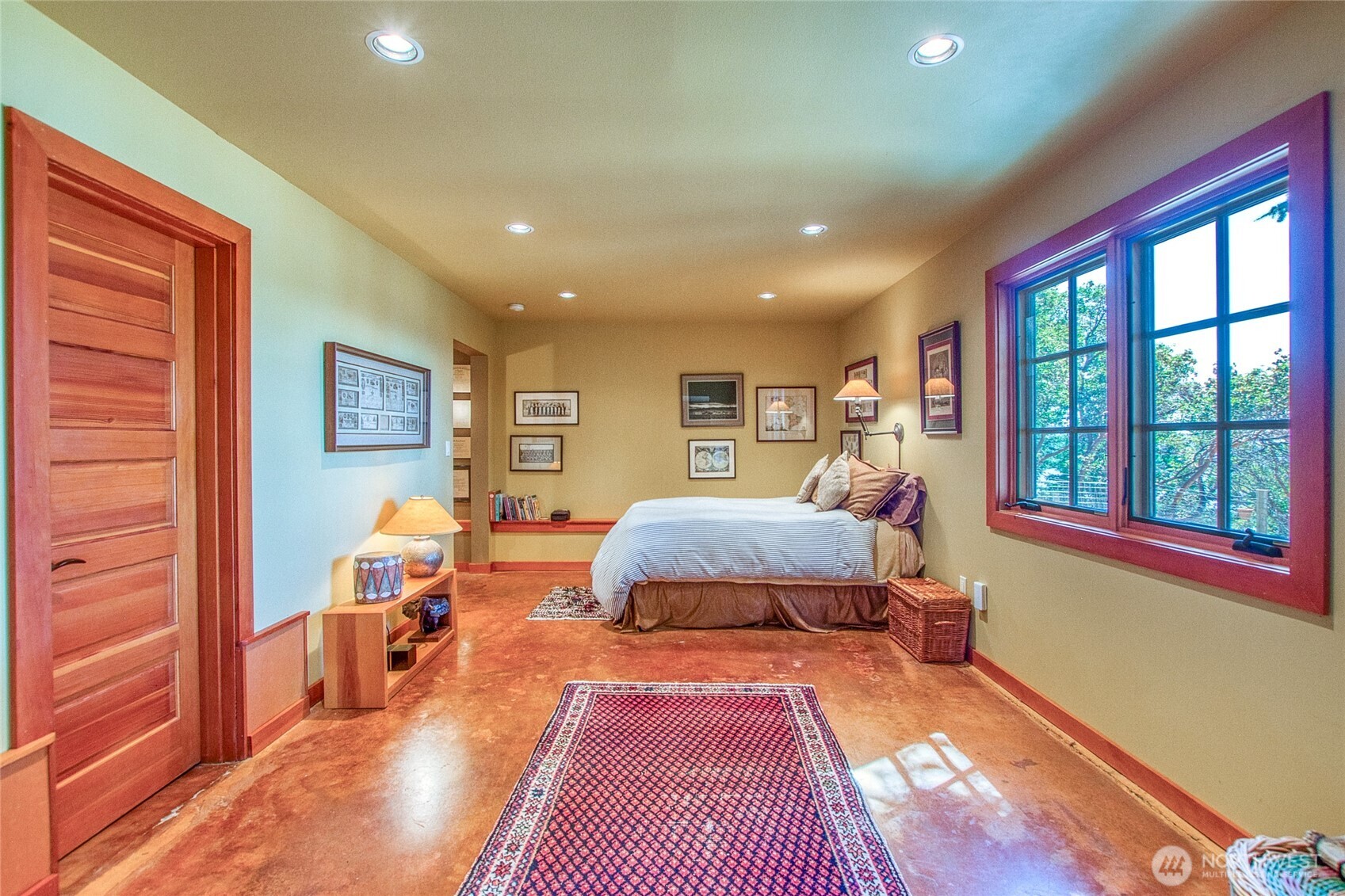 64 Hammond Lane Orcas Island, WA 98245 - Photo 25 of 39 a bedroom with a large bed and a window