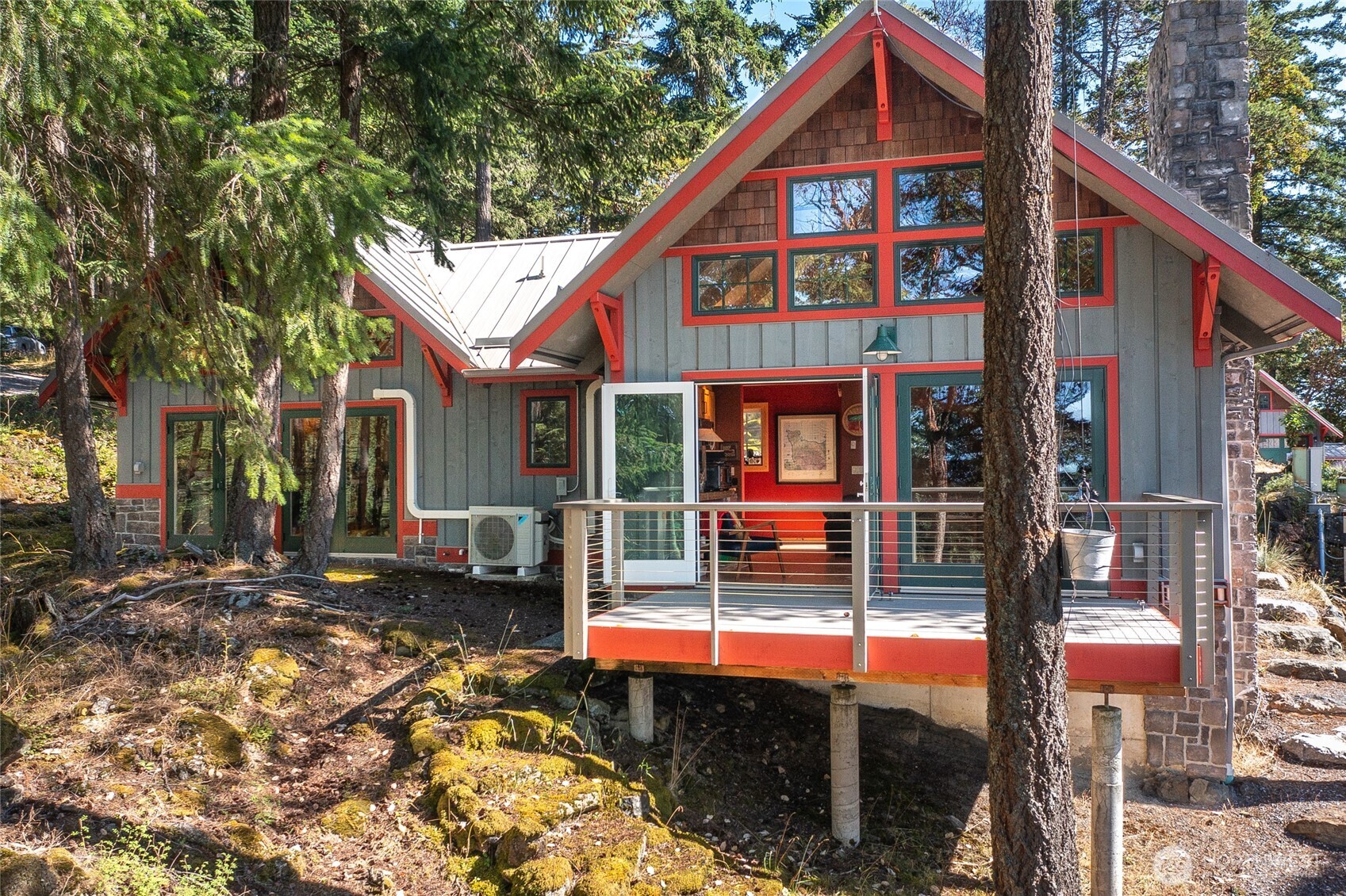 64 Hammond Lane Orcas Island, WA 98245 - Photo 30 of 39 a front view of a house with a yard