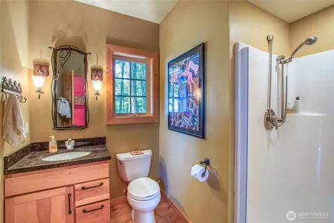 a room with lots of wooden furniture and a floor to ceiling window