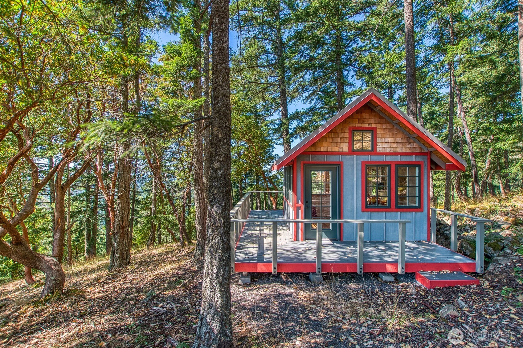 64 Hammond Lane Orcas Island, WA 98245 - Photo 36 of 39 a front view of a house with a yard