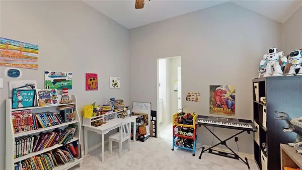 a view of a workspace with furniture and toys