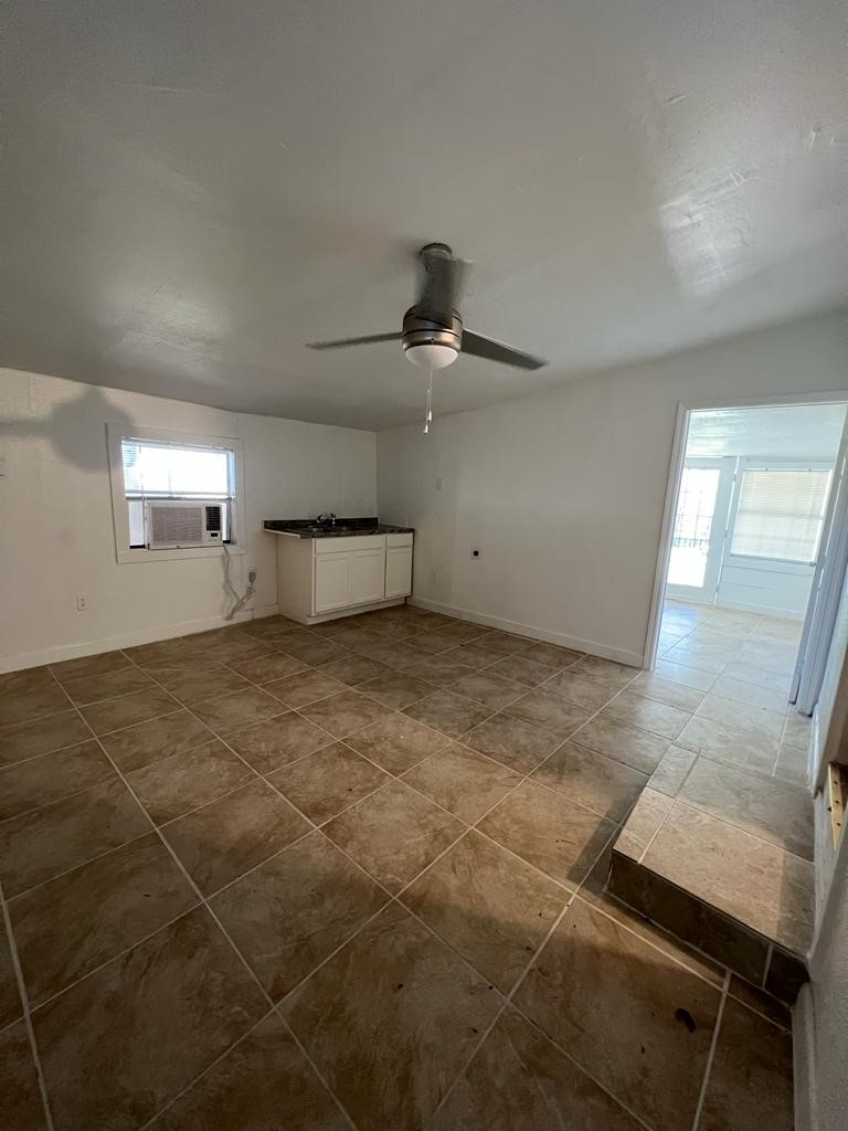 1272 Pecan Street, Unit B Clute, TX 77531 - Photo 4 of 10 a view of an empty room