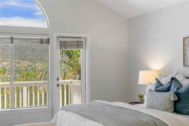 an empty room with a empty space and windows