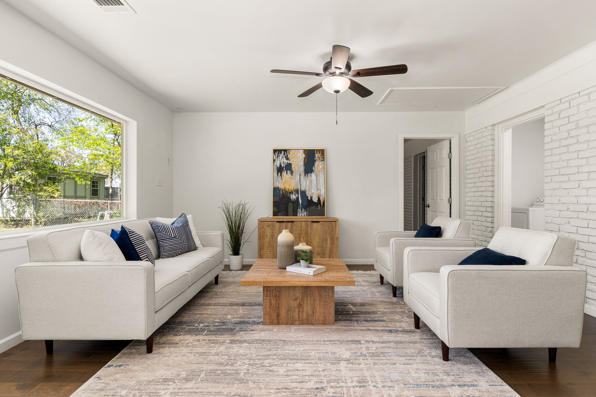 11800 Oak Haven Road Austin, TX 78753 - Photo 14 of 37 a living room with furniture and a large window