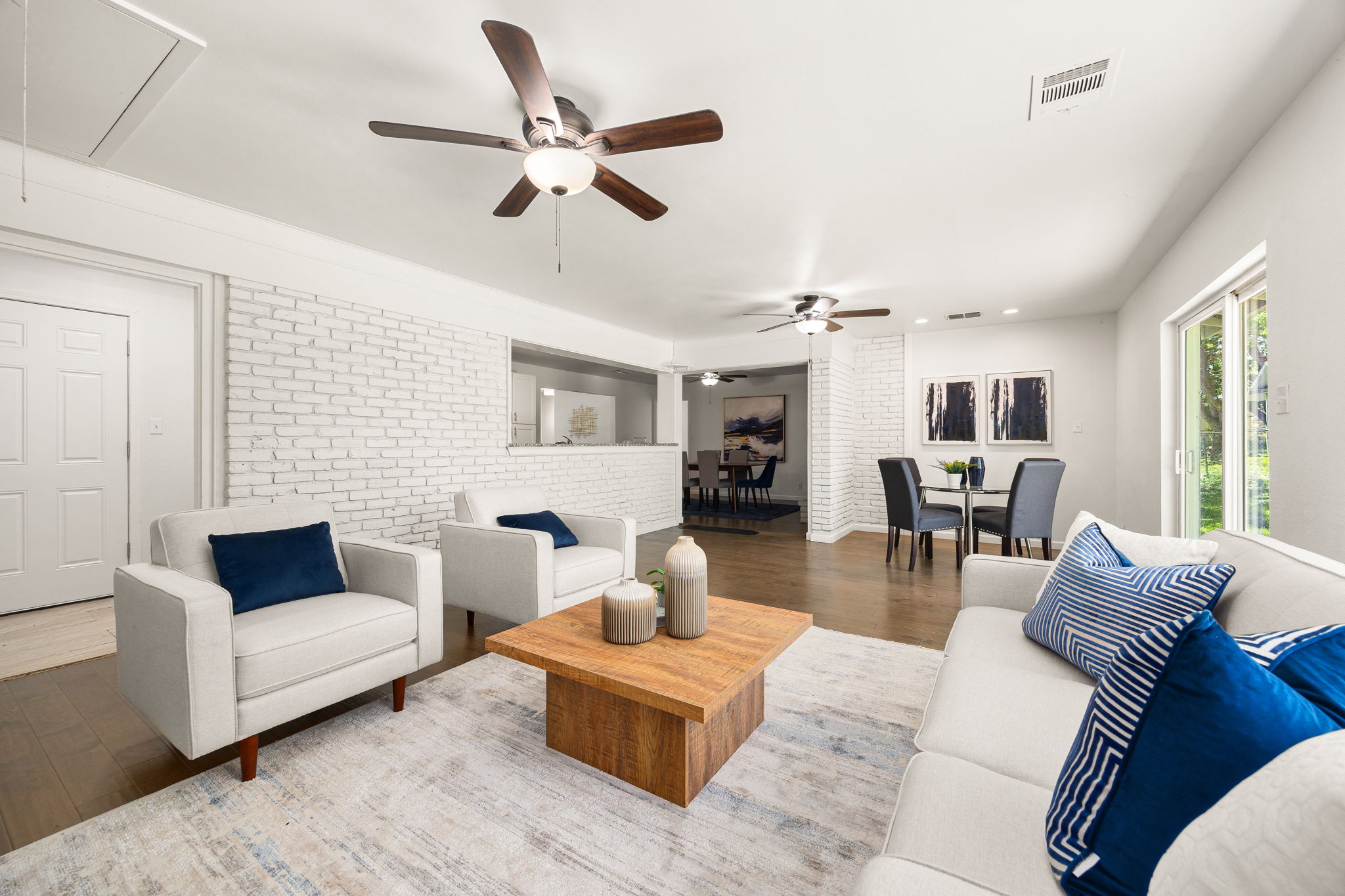 11800 Oak Haven Road Austin, TX 78753 - Photo 17 of 37 a living room with furniture and a large window
