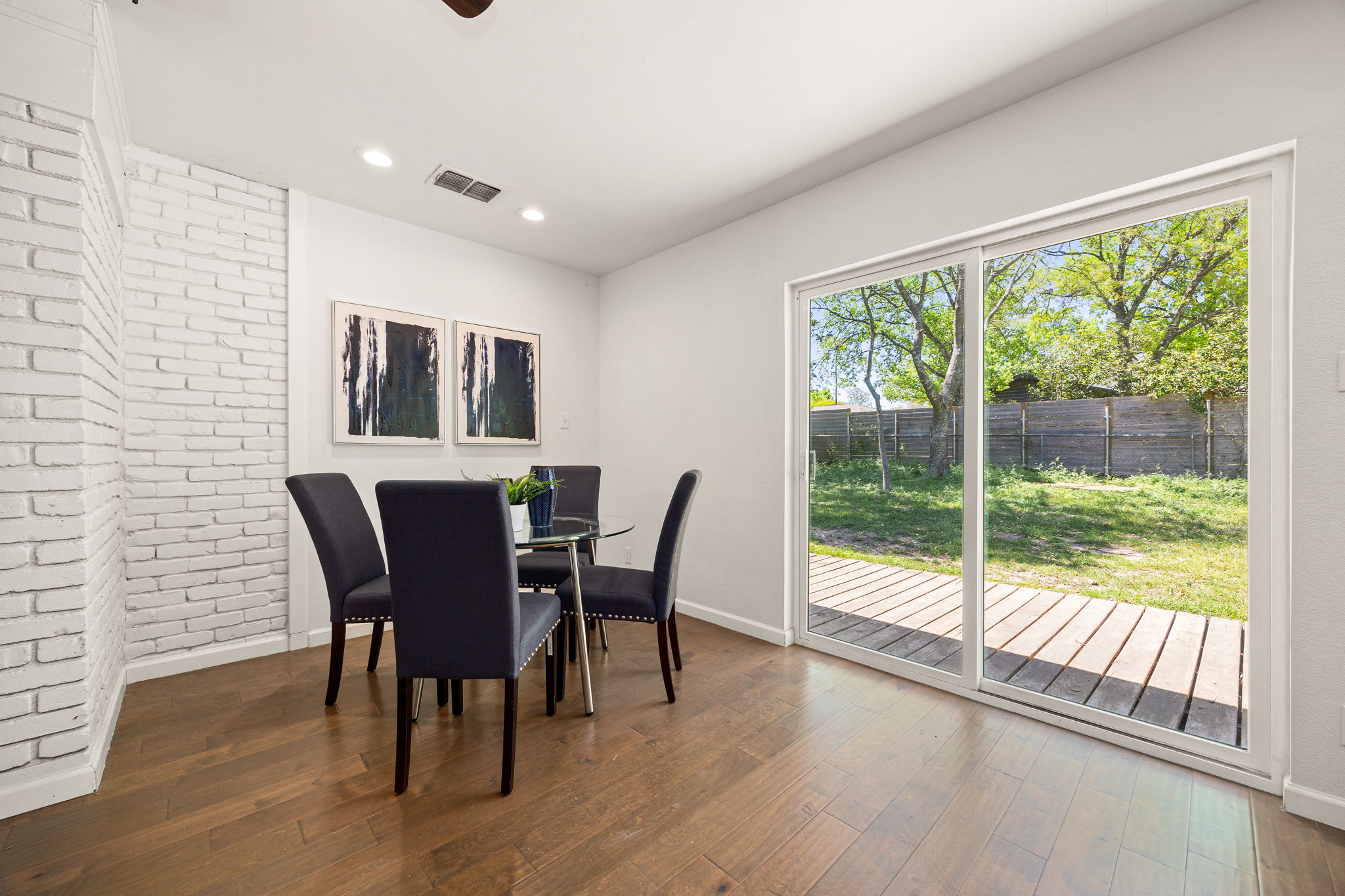 11800 Oak Haven Road Austin, TX 78753 - Photo 18 of 37 a view of a dining room with furniture and wooden floor