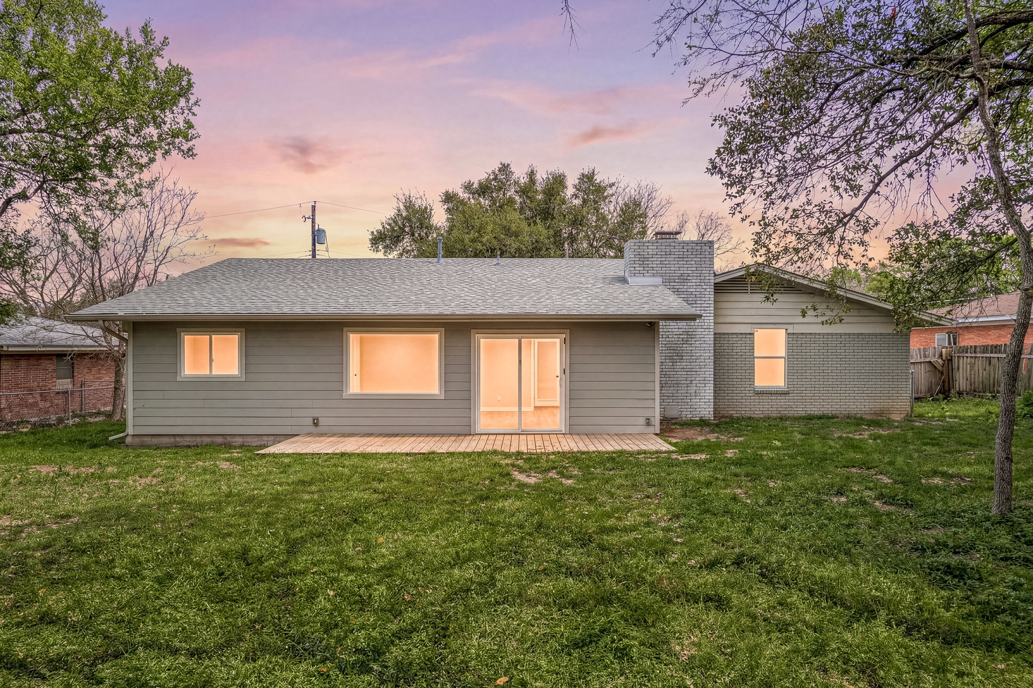 11800 Oak Haven Road Austin, TX 78753 - Photo 35 of 37 a front view of a house with a yard and garage